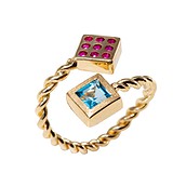 Женское золотое кольцо с топазом и рубинами