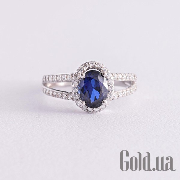 

Женские кольца Украина, Женское серебряное кольцо с куб. циркониями и сапфиром, 17.5