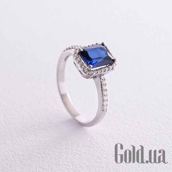 

Женские кольца Украина, Женское серебряное кольцо с куб. циркониями и синт. сапфиром, 17