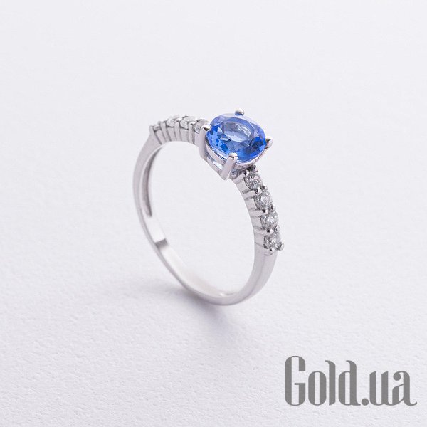 

Женские кольца Украина, Женское серебряное кольцо с куб. циркониями и синт. танзанитом, 18