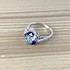Женское серебряное кольцо с топазом и куб. циркониями - фото 2