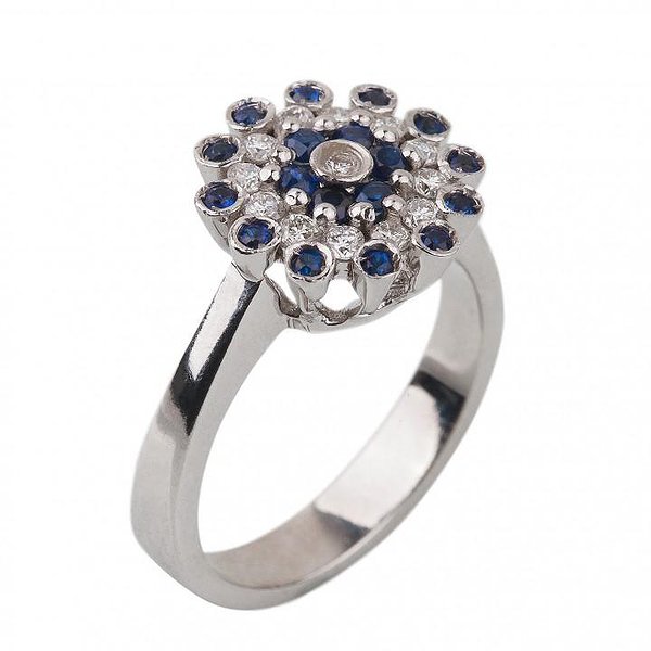 Женское золотое кольцо с бриллиантами и сапфирами