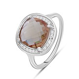 Женское серебряное кольцо с куб. циркониями и султанитом