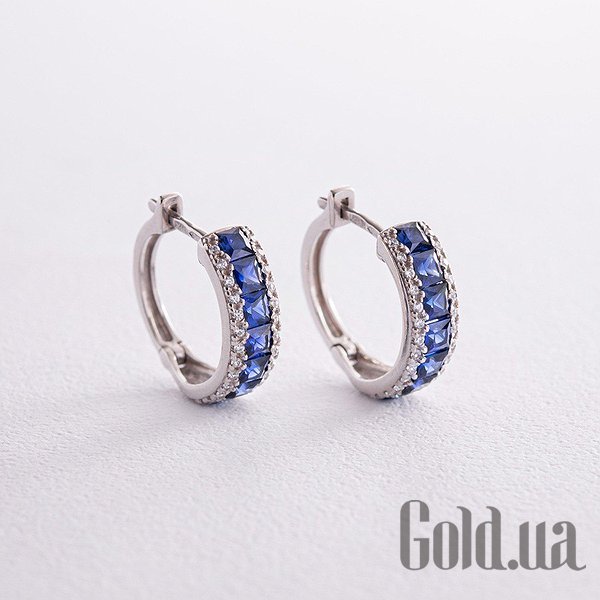 

Серьги Украина, Серебряные серьги с куб. циркониями и синт. сапфирами