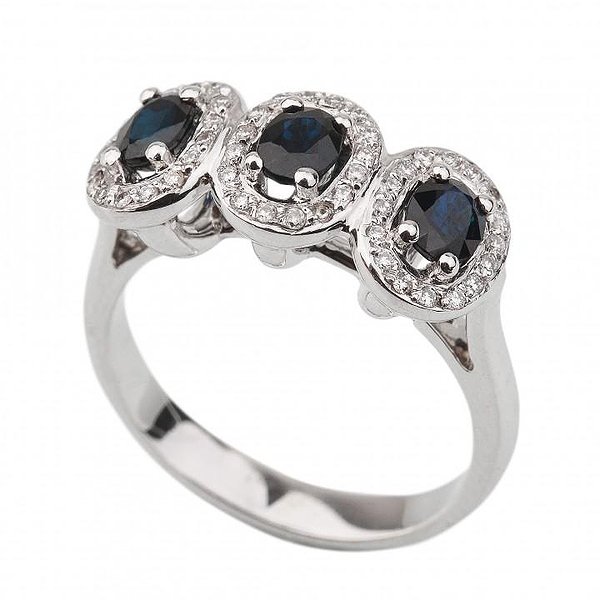 Женское золотое кольцо с бриллиантами и сапфирами