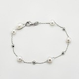 Жіночий срібний браслет з перлами