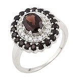 Женское серебряное кольцо с гранатами и куб. циркониями (0477633), фото