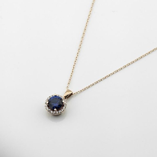 Золотой кулон с цепочкой с куб. циркониями и синт. сапфиром