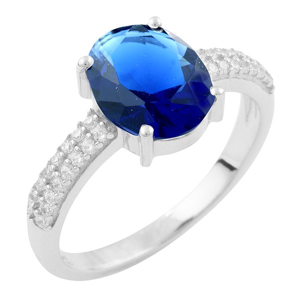 Женское серебряное кольцо с синт. сапфиром и куб. циркониями