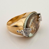 Женское золотое кольцо с кварцем и куб. циркониями